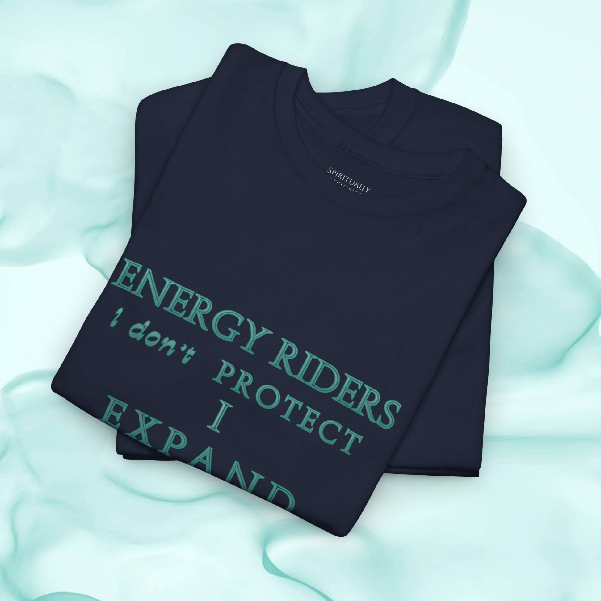 2026 trend t-shirt spiritually designed winted season blue navy cotton t-shirt with graphic text style ' energy riders i don't protect i expand' with jupiter planet symbol in  green turquoise colo minimalist style premium quality high vibrational clothing innovative fashion concept