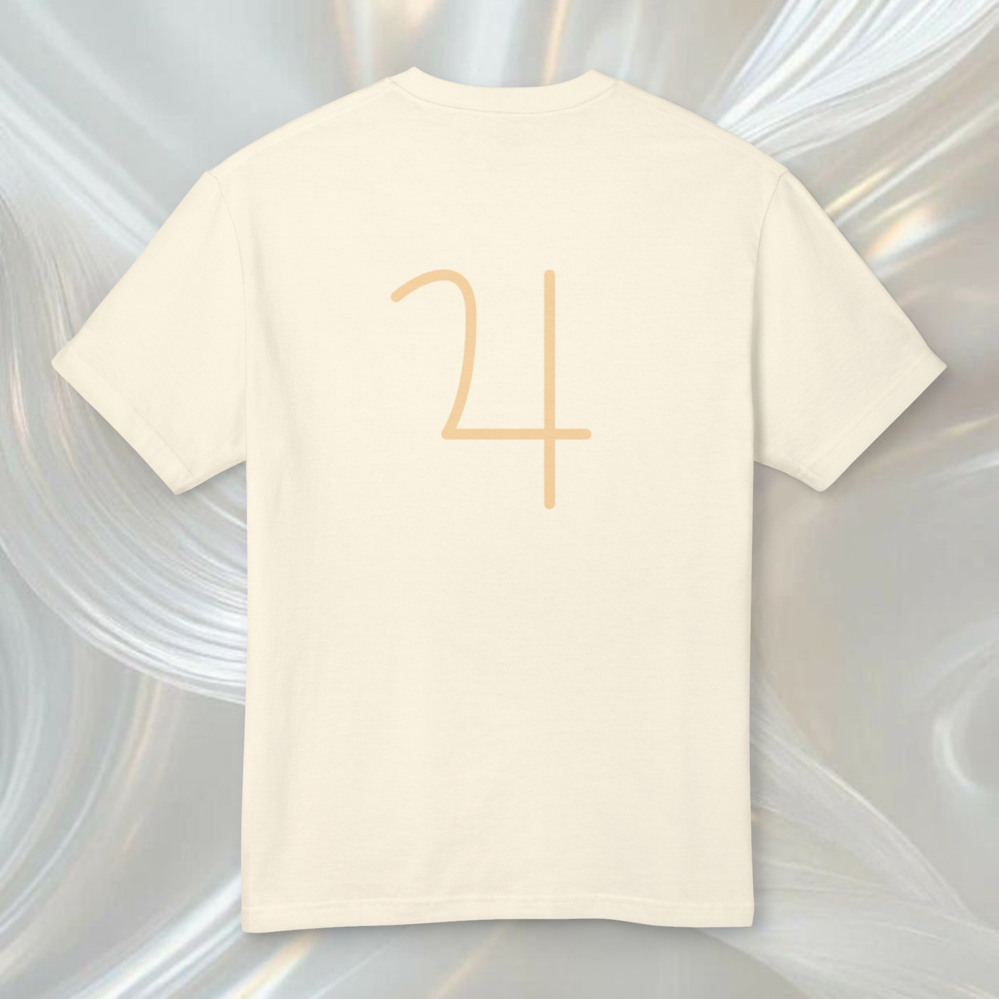 a white faded cream color t-shirt with the graphic of symbol of jupiter on a white ethereal background spiritually designed high vibrational clothing
