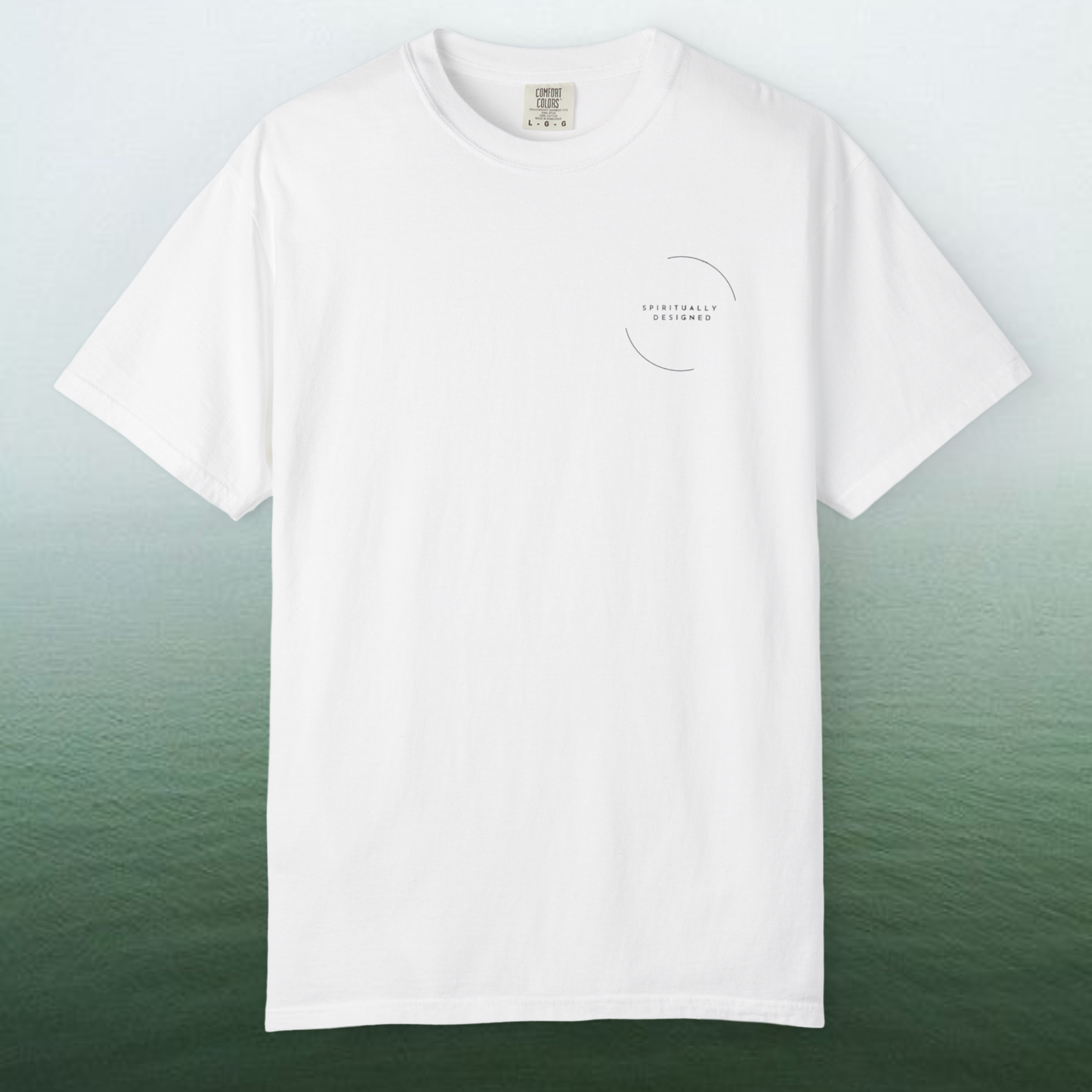 spiritually designed t-shirt white color 100% cotton premium quality minimalist design high vibrational clothing presented on a green white background